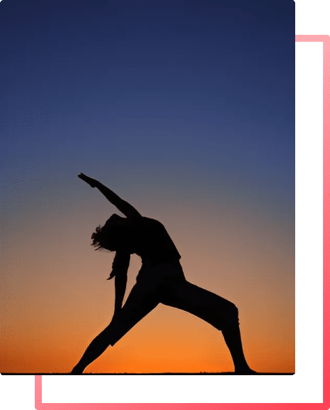 A female silhouette in a yoga pose to demonstrate strong emotional health.